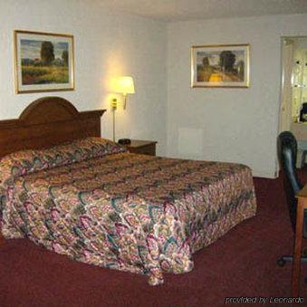 Harrisonville Inn & Suites Habitación foto